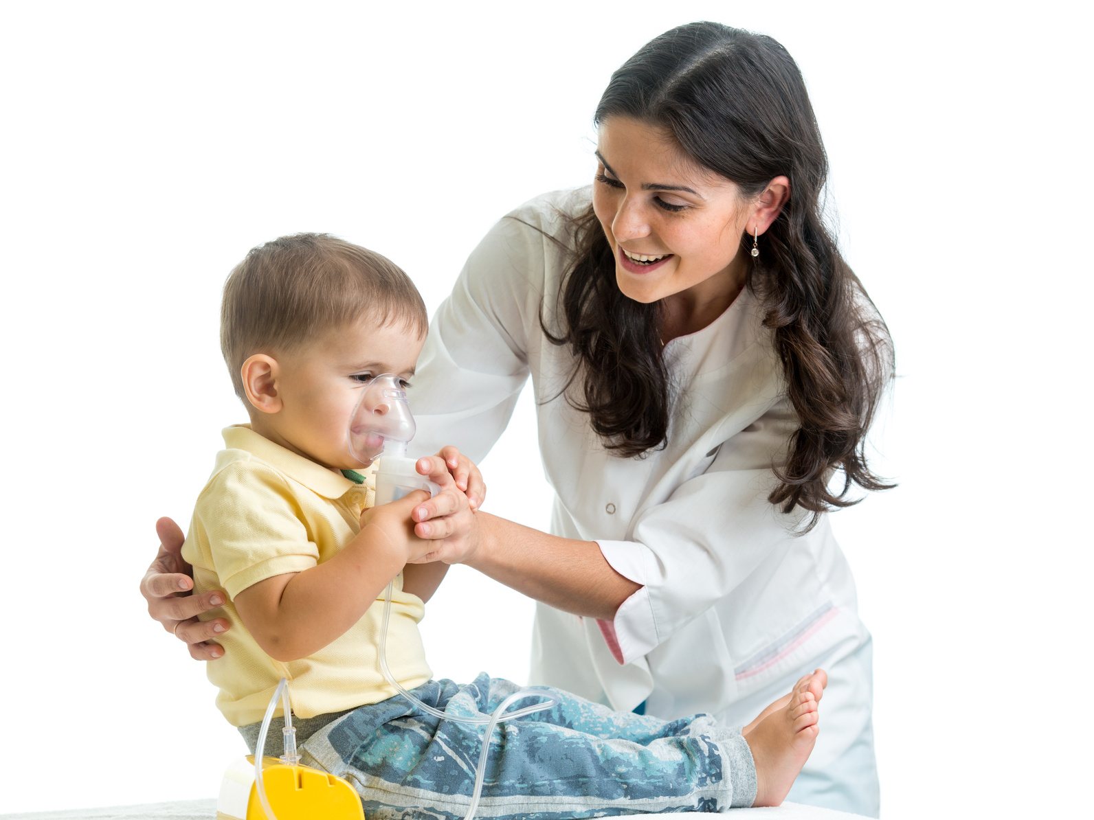 Doctor holding inhaler mask for child breathing